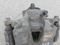 Суппорт тормозной Kia Sportage QL 2015-2022 Перед. Лев.