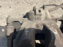 Суппорт тормозной Toyota Corolla E210 E210 2018- Перед. Лев.