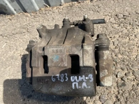 Суппорт тормозной Mitsubishi Outlander 3 GF 2012-2023 Перед. Лев.